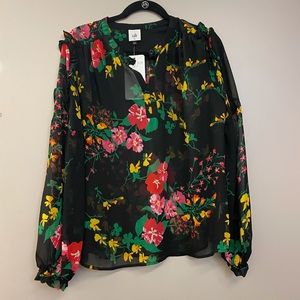 Cabi thespian blouse, midnight flowers. Sheer with ruffles on shoulder
